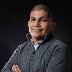 Dr. Carlos Monroy Associate Professor; Fellow of the Core