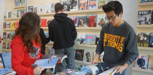 University of St. Thomas students at TOMO mags magazine shop in the Montrose neighborhood of Houston, Texas