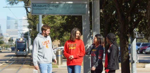 University of St. Thomas students at Metro station in the Houston, Texas Museum District