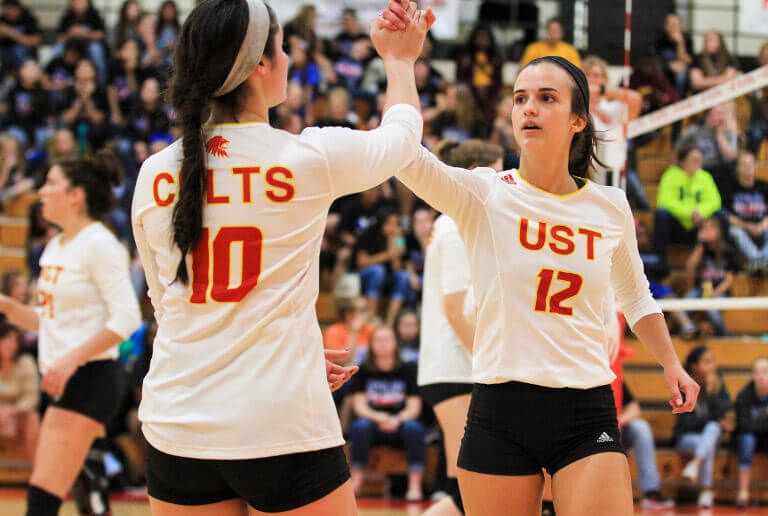 University of St. Thomas - Houston biology grad Emily Erwin in volleyball match