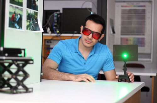 Physics minor works with laser at the University of St. Thomas in Houston, Texas