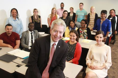 Graduate students in classroom at University of St. Thomas Cameron School of Business in Houston, Texas