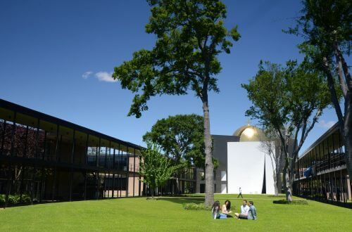 Academic mall with Chapel of St. Basil in the background on the campus of the University of St. Thomas in Houston, Texas