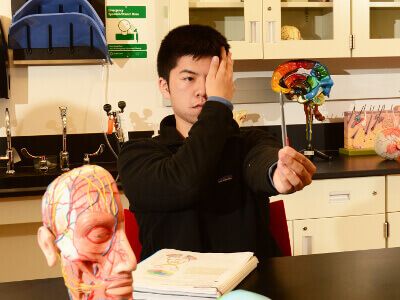 Male student in pre-optometry class at the University of St. Thomas - Houston