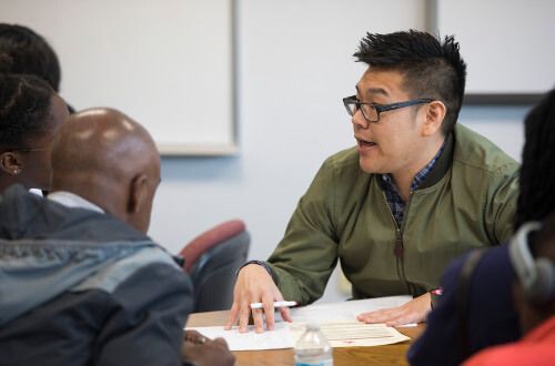 HPAC pre-med advisor Dr. Edward Nam with students at the University of St. Thomas - Houston
