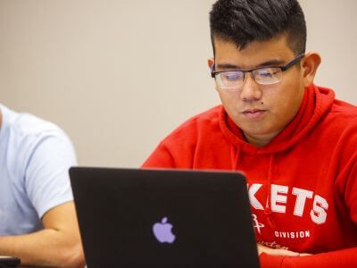 Student taking exam on computer