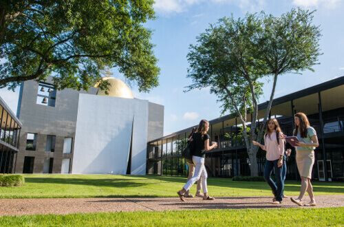 University of St. Thomas - Houston students walk in front of Chapel of St. Basil