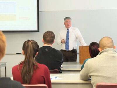 Dr. Jon Taylor teaches a Political Science class at the University of St. Thomas - Houston