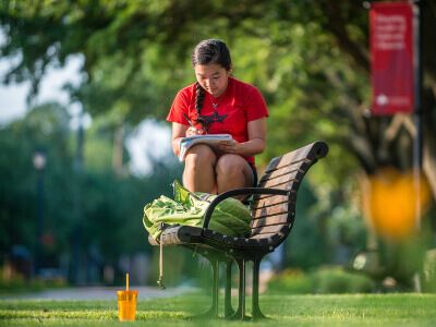 Female undergraduate student on campus at the University of St. Thomas in Houston, Texas