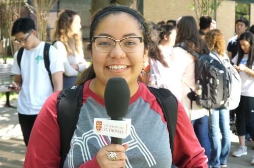 Student holding microphone on campus of University of St. Thomas in Houston, Texas  (part 1)