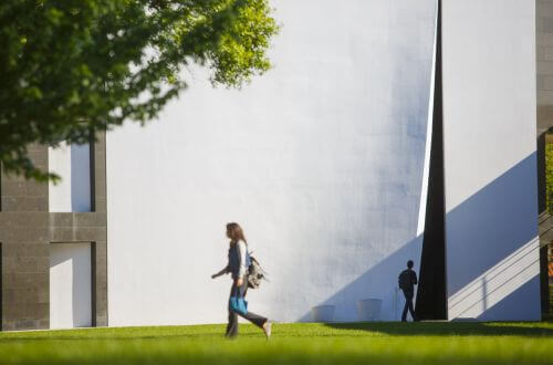 University of St. Thomas - Houston MSA Master of Science in Accounting student walks in front of the Chapel of St. Basil