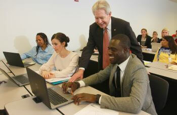 University of St. Thomas - Houston MSF Master of Science in Finance students work in classroom