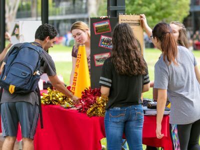 UST Cheer table at Council of Clubs Club Fair on the campus of the University of St. Thomas in Houston Texas