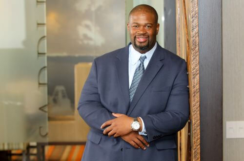 University of St. Thomas - Houston MBA Master of Business Administration graduate in office