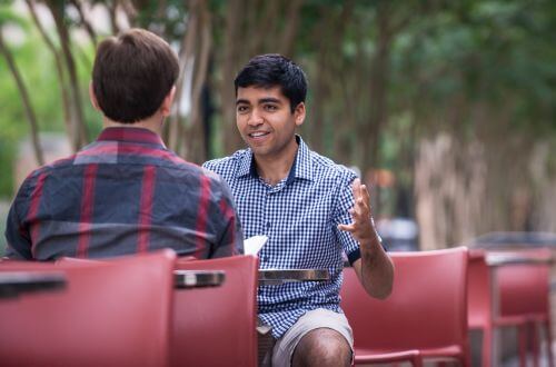 Psychology majors sit and talk on University of St. Thomas - Houston campus