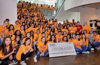 Large group of University of St. Thomas - Houston psychology majors participate in service learning