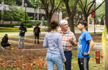 Two University of St. Thomas - Houston Criminology majors talk on campus