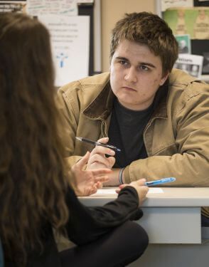 Tutor working with student at University of St. Thomas in Houston, Texas