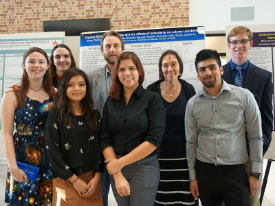 University of St. Thomas - Houston BS in Physics students with two Physics professors