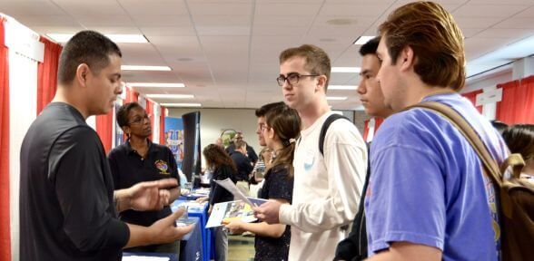 Students at job fairon the campus of the University of St. Thomas in Houston, Texas