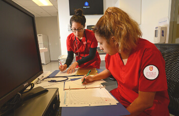 University of St. Thomas - Houston MSN Degree Program students working in hospital