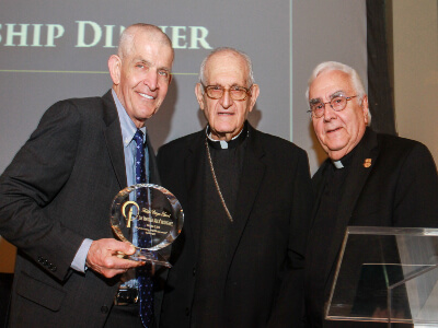 2018 Faithful Citizen Jim 'Mattress Mack' McIngvale (left) with Most Reverend Joseph A. Fiorenza, DD (center) and founder Fr. Donald S. Nesti, CSSp (right)